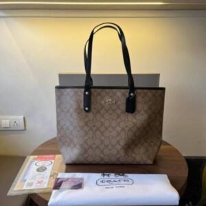 Coacch city tote bag in signature Canvas With Ogbox Dustbag