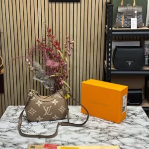 LOUIS VUITTON BICOLOR MONOGRAM EMPREINTE