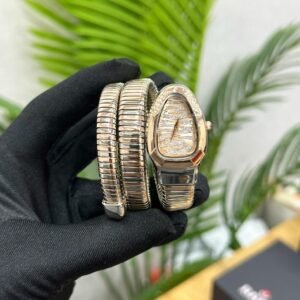 Bvlgari Serpenti gold-colored snake-shaped watch, possibly a Franck Muller